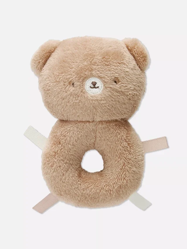 Brinquedo de peluche em forma de urso