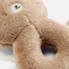 Brinquedo de peluche em forma de urso