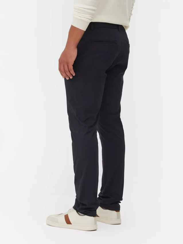 Calças chino justas elásticas