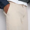 Calças chino largas de cintura média