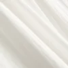 Calças de perna larga com textura