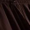 Calças de perna larga com textura