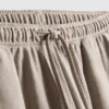 Calças de perna larga com textura