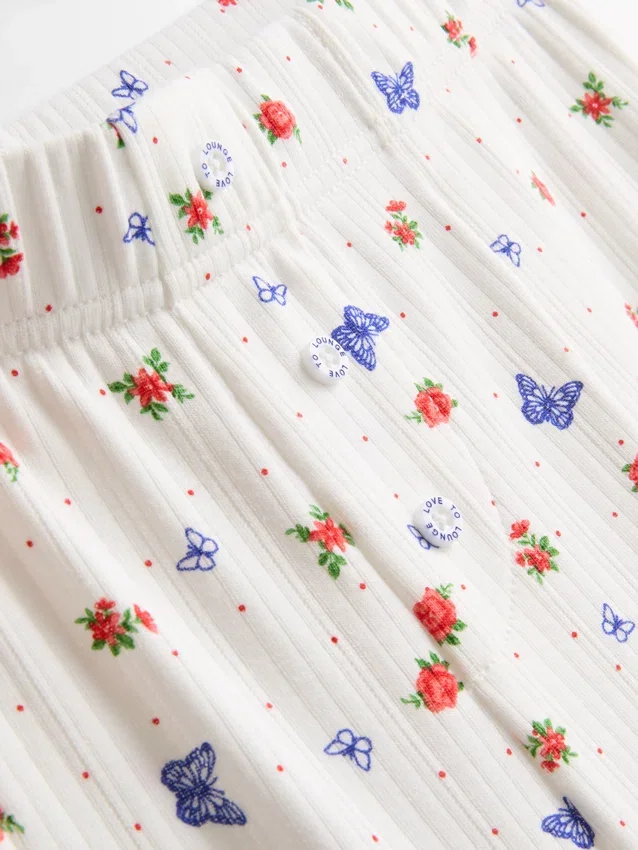 Calças de pijama com padrão de borboletas em canelado