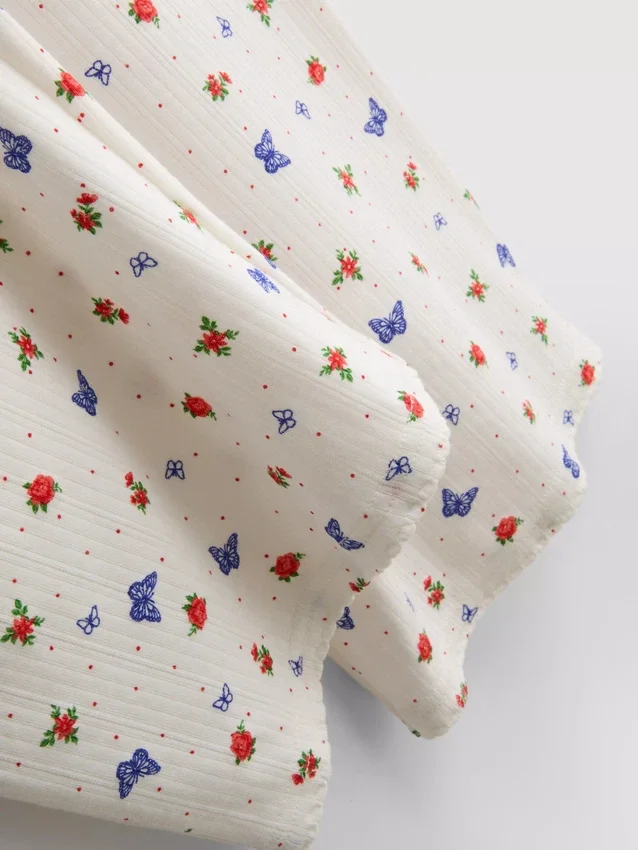 Calças de pijama com padrão de borboletas em canelado