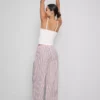 Calças de pijama às riscas em algodão