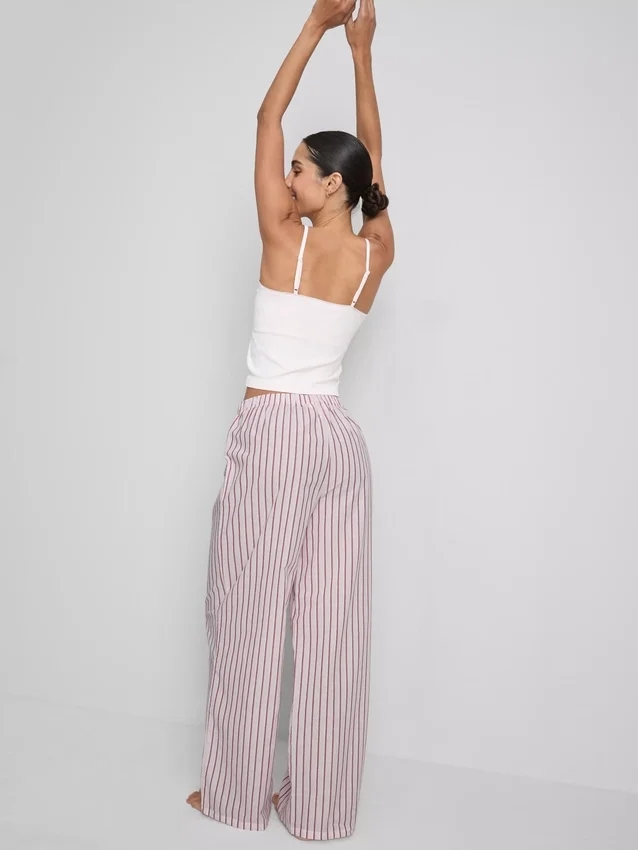 Calças de pijama às riscas em algodão