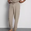 Calças de pijama às riscas texturizadas