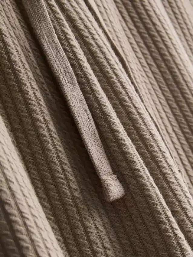 Calças de pijama às riscas texturizadas