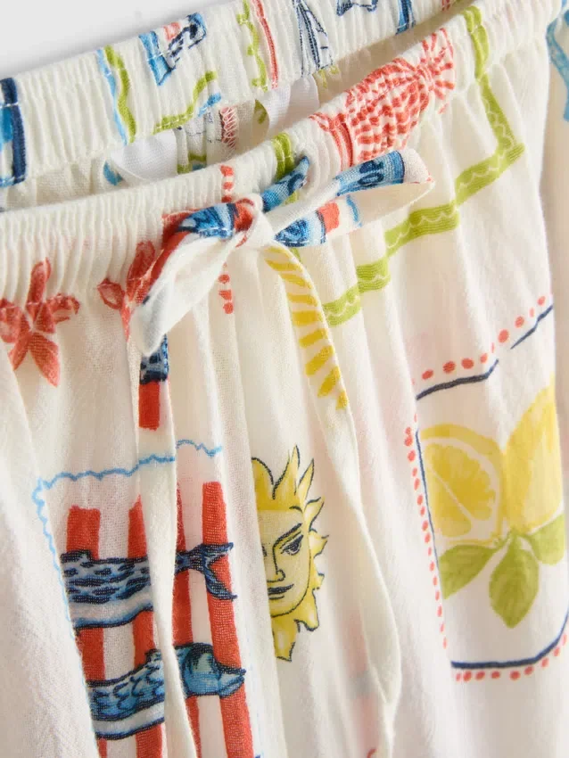 Calças de praia largas estampadas