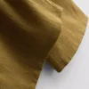 Calças largas com efeito enrugado