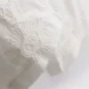 Calças largas de algodão bordadas