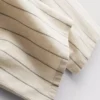Calças largas às riscas em mistura de algodão