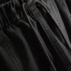 Calças utilitárias de perna larga com detalhes nas costuras