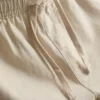 Calções com cordão em mistura de linho