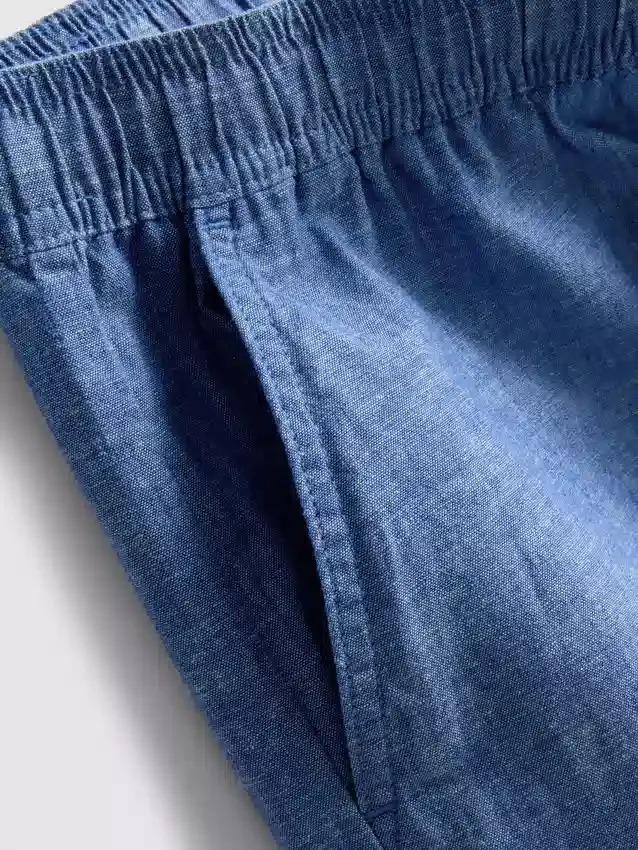 Calções com cordão em mistura de linho