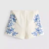 Calções de algodão com bordado floral
