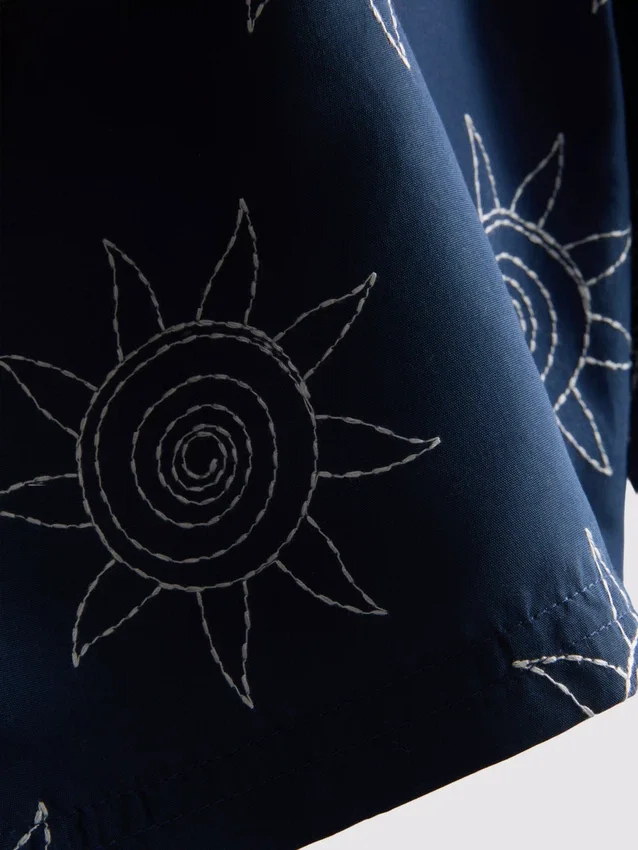 Calções de banho bordados com motivo solar