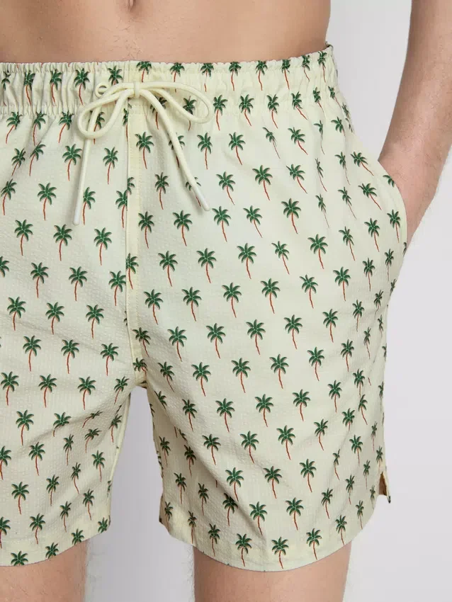 Calções de banho com textura de palmeiras