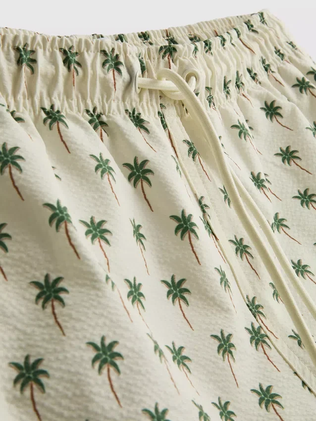 Calções de banho com textura de palmeiras