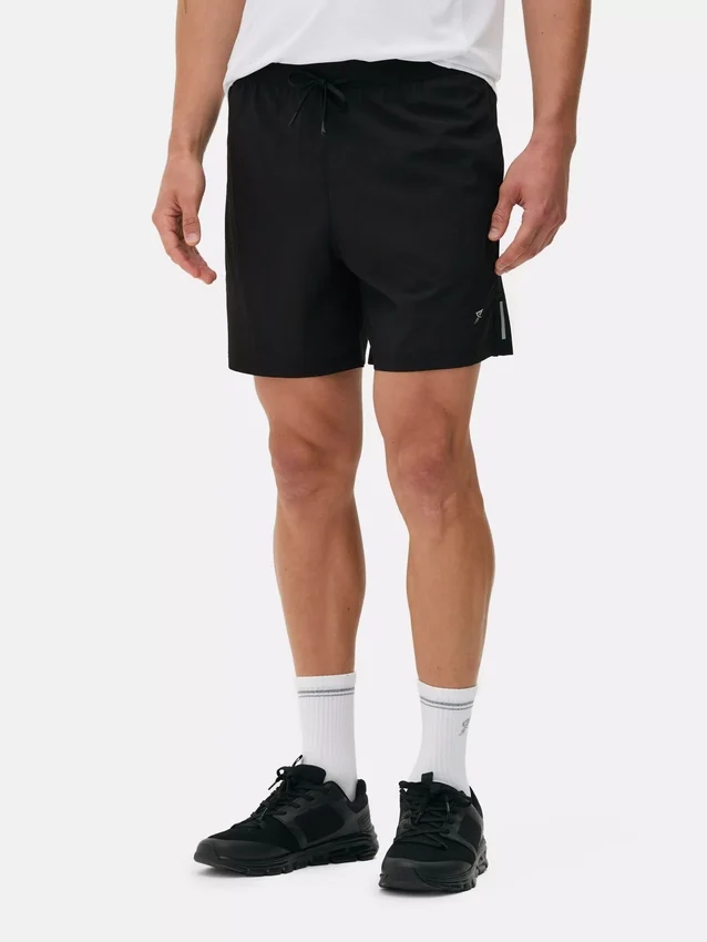 Calções de corrida com cordão