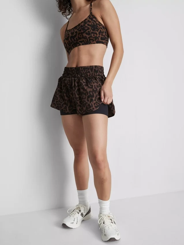 Calções de corrida com padrão de leopardo