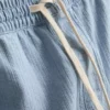 Calções de ganga texturados com cordão