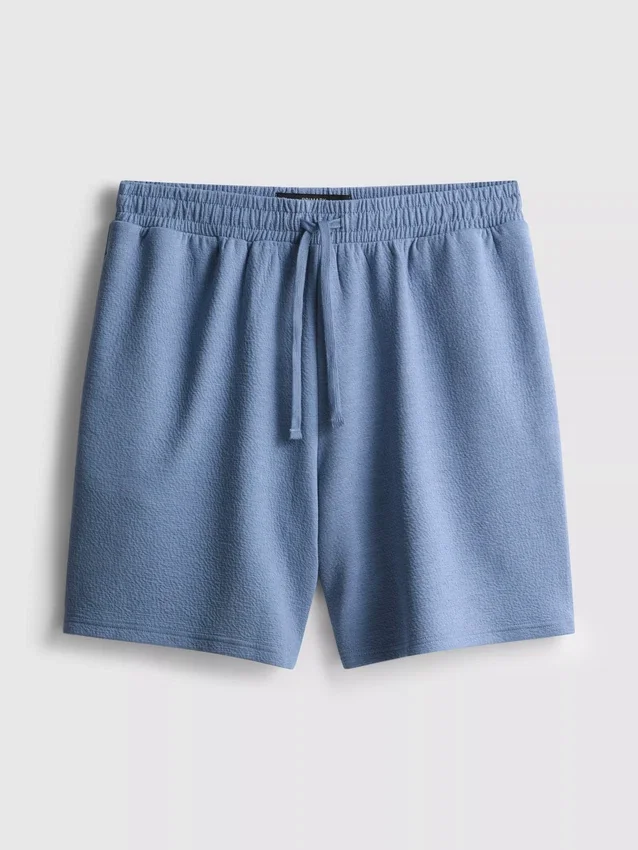 Calções de pijama com cordão texturizados