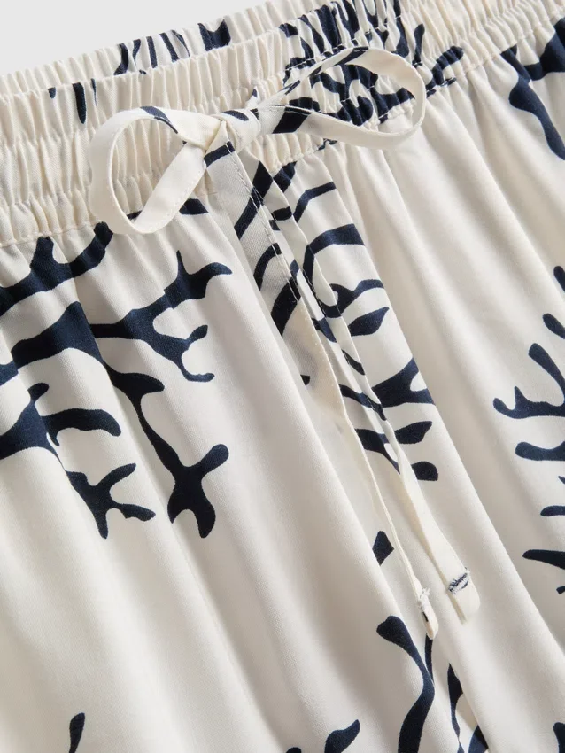 Calções de pijama estampados em tom de coral