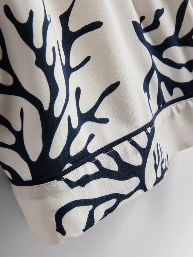 Calções de pijama estampados em tom de coral