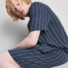 Calções de pijama às riscas