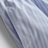 Calções de pijama às riscas
