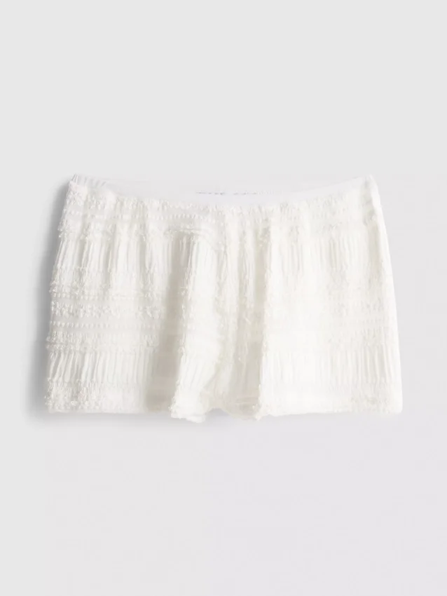 Calções tipo bloomer com folhos