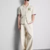Camisa com gola revere e estampado paisagístico