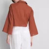 Camisa curta de algodão com laço à frente