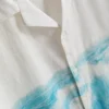 Camisa de calção de manga curta com botões e estampado panorâmico
