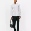Camisa de manga comprida às riscas