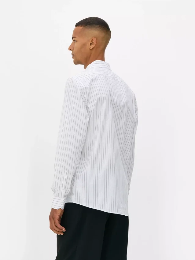 Camisa de manga comprida às riscas