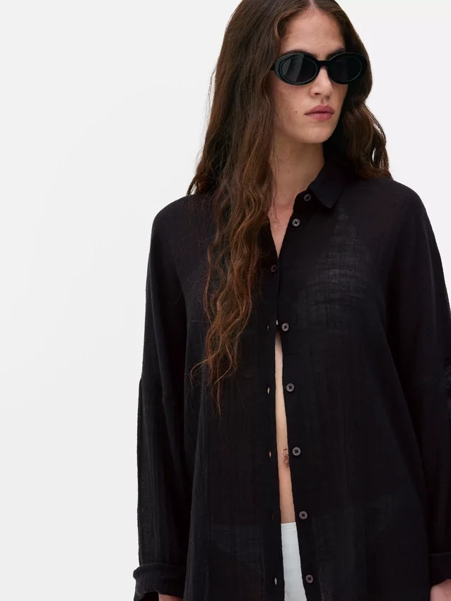 Camisa de praia transparente