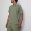 Camisa polo com gola com fecho e textura