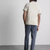 Camisa polo com gola com fecho e textura