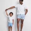 Camisas com gola reversível bordada com peixe
