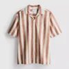 Camisas com gola reversível às riscas