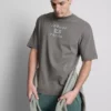 Camisas com grafismo de corridas da Jaguar TCS