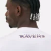 Camisas com logótipo dos Baltimore Ravens da NFL