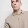 Camisas de manga curta