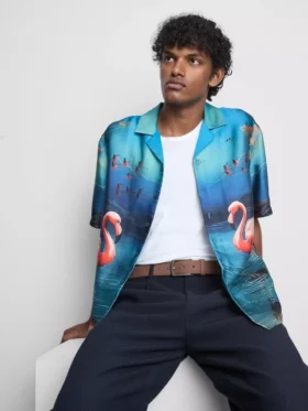 Camisas de manga curta com botões e estampadas com flamingos
