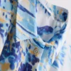Camisas de praia de algodão estampadas com botões
