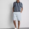 Camisas em malha com riscas texturadas