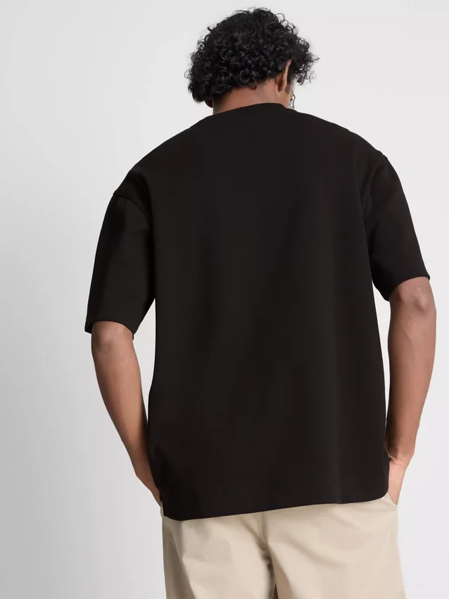 Camisas folgadas de manga curta